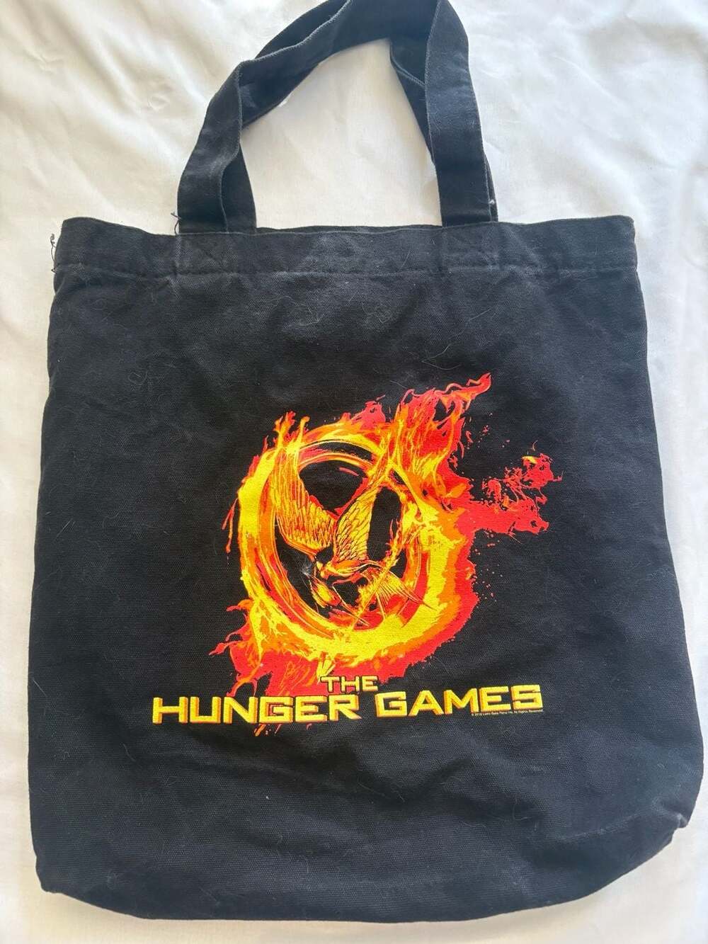 The Hunger Games Movie Logo Black Canvas Tote Bag